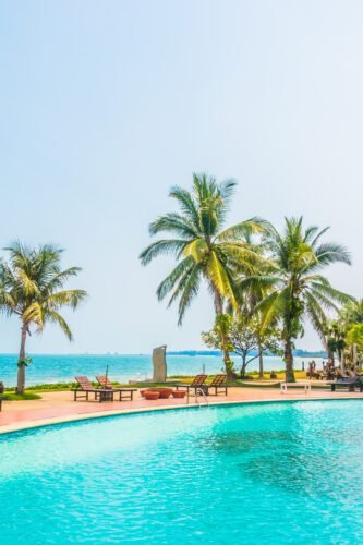 Beautiful luxury outdoor swimming pool in hotel resort - Boost up color Processing